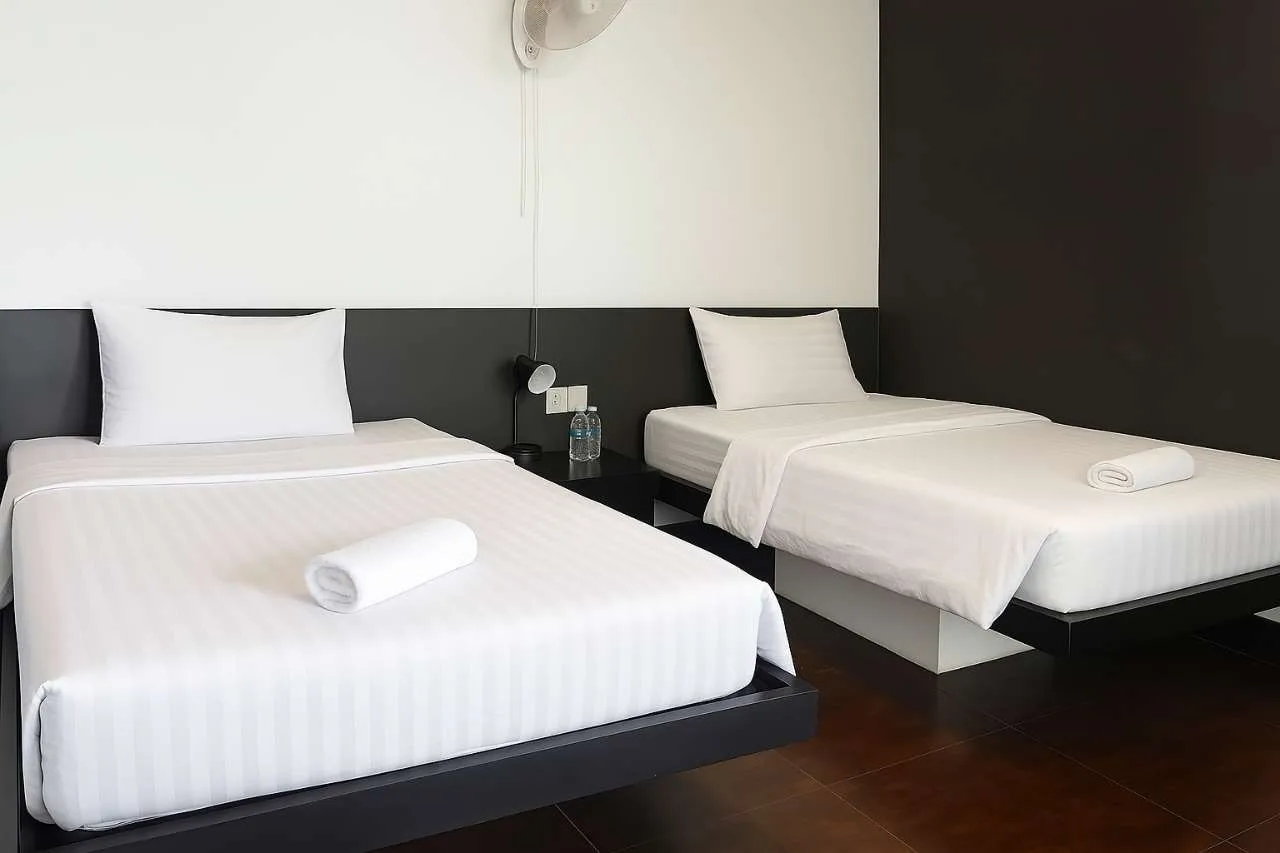 Twin Bedroom with Balcony and Pool View