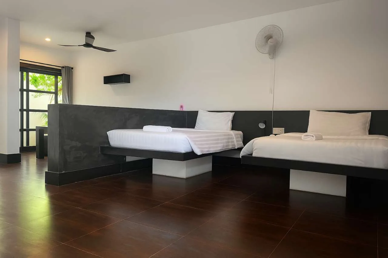Twin Bedroom with Balcony and Pool View